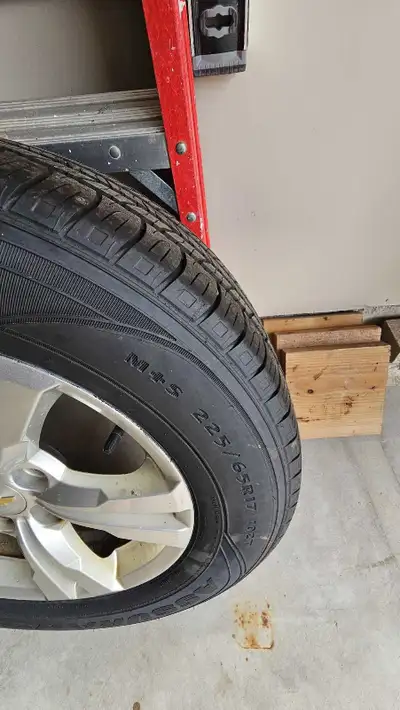 Barely used all season tires with rims with censors. They came off a Chevy Equinox and are barely us...