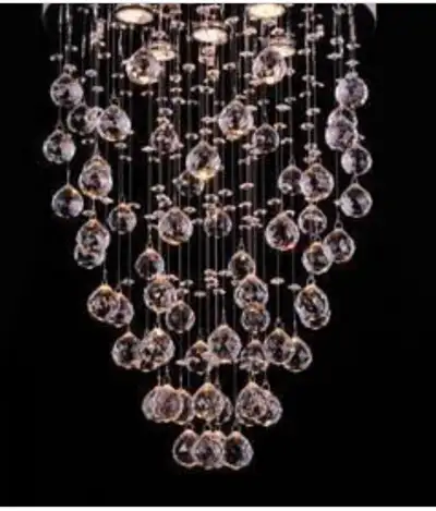 Modern ceiling light fixture with hanging crystal balls., View more