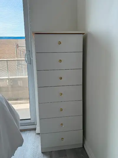 Great for a small space or condo. Skinny dresser with lots of storage options. I dressed this piece...