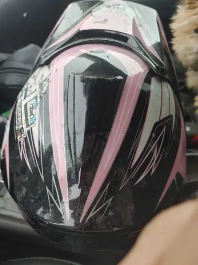This is a used PHX helmet, designed for safety and style! It's in fair condition, perfect for your n...