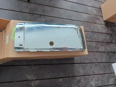 Set of rear Chrome bumper end caps for 2012 Chevy Silverado will fit other years. Has a small dent o...