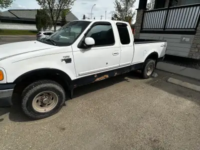 Selling a 2000 Ford F150 7700 pickup truck, currently not running. Ran 16months ago when I parked it...