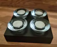 glass tealight holders on wood block