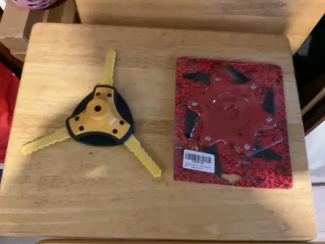 Two new weed wacker blades