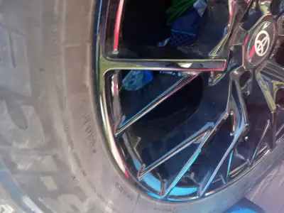 225 60 18 almost new tires and rims of a toyota venza.no longer have the vehicle and tires and rims...