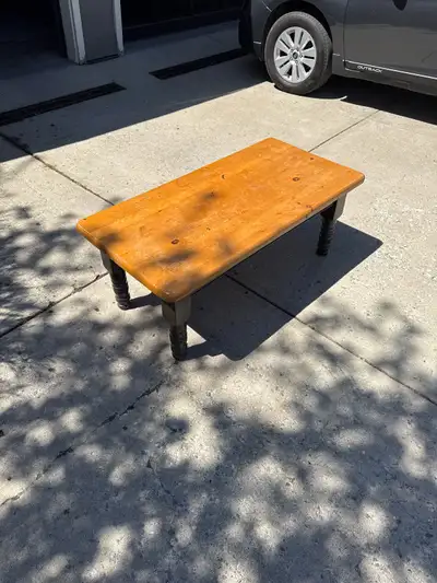 Solid wood, coffee table. Shows some wear. 48in by 24in and 19in tall. Would be great if refinished....
