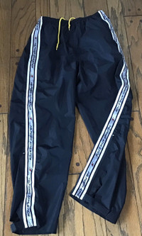 Vintage Tommy Hilfiger black windbreaker pants, size medium
