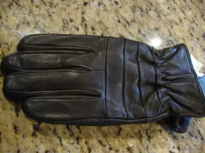 Selling a Brand New pair of Men's Leather Gloves - Brown. The brand is Mountain Ridge. They are size...