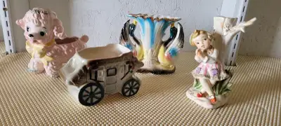 In Rycroft. $2.00 each. 4 vintage planters. Planter with ducks – 6 inches wide. 1961 lamb planter, m...