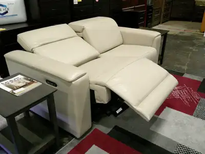 Condo size Sofa top Grain Leather power recliner with power head rest. Super comfy. 1 new in box plu...