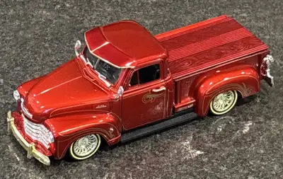 1/32 scale diecast low rider, '53 Chevy 3100 pickup truck MIB, View more
