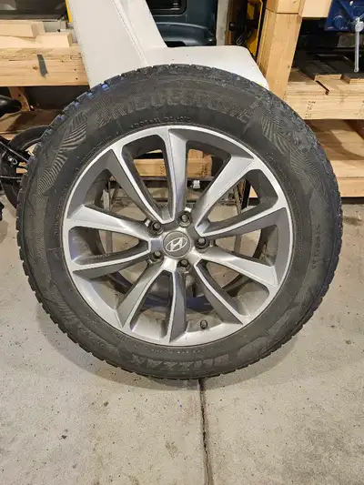 Hyundai tires on rims. Tires are blizzaks (winter) 235 60R 18 Rims are 5 x 4.5in Center bore 67.1mm...
