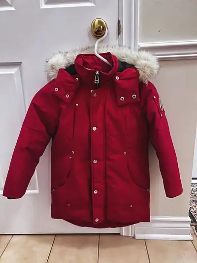 Keep your little one cozy and stylish with this Moose Knuckles kids' winter jacket, size S (Small)....