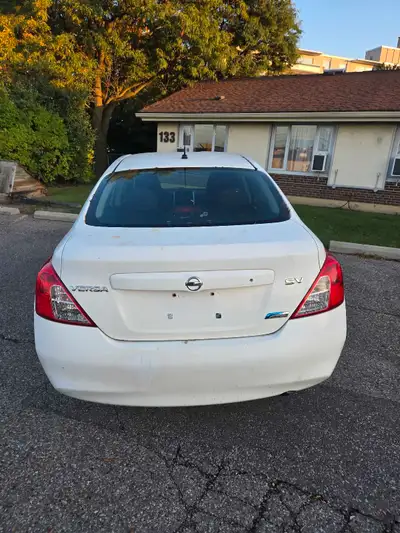 This is a 2012 Nissan Versa, offering reliable and efficient transportation. The car is in used cond...