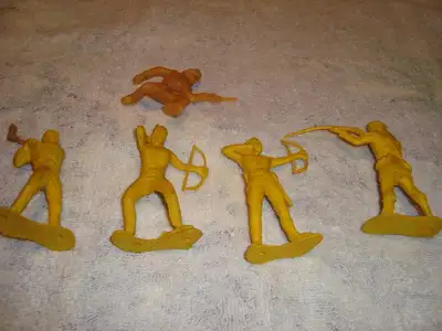 Five 70mm Frontiersmen/Native figures for sale These are 70mm. 4 are made of soft pliable rubber, th...