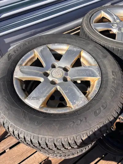 Set of 4 studded winter tires and rims Lots of tread left! Size 215/70R16 Located in Tatamagouche