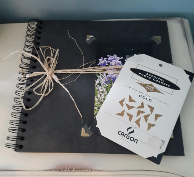 Black spiral bound photo book / scrapbook + archiv photo corners