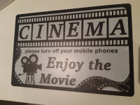 Home Cinema Tin Sign