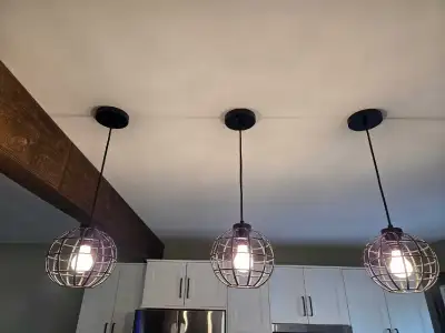 Chandelier and three hanging lights , View more