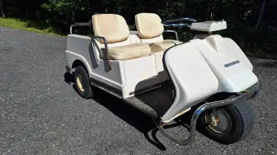 Harley Davidson three wheeled golf cart. Reverse does not work. Age unknown.