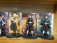 5 demon slayer figures with boxes ( $150)