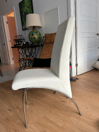 2 white leather chairs from Upper Room