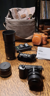 Sony Alpha 5100 mirrorless camera with 3 lenses