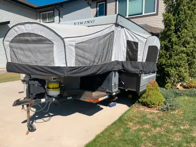 This price is firm! Kitchen slide out, indoor toilet and shower, insulated king and queen beds with...