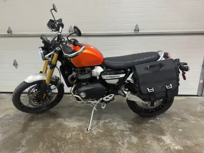 Selling my 2024 Triumph Scrambler 1200 XE in Baja Orange with only 679 km. This bike is in like new...