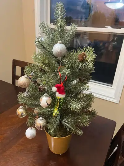 Mini Christmas Tree. Fake. Comes with all ornaments except the pickle.