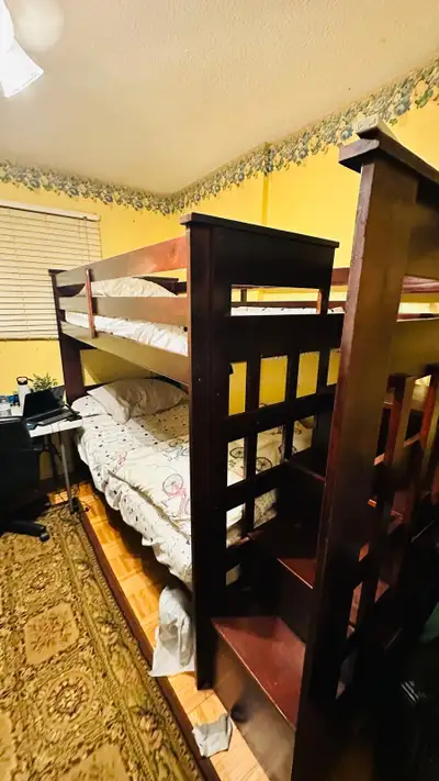 Bunker bed (twin mattress) both size are Twins, real wood,, View more
