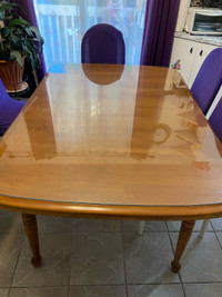 Wood table with glass on the top 