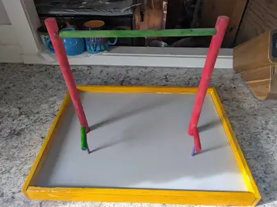 Well made wood and melamine parrot playground. One long high perch, two small low perches. Recently...