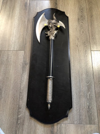 Axe with hidden dagger