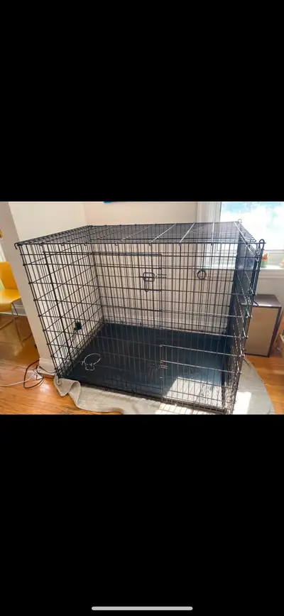Very large used dog crate. Perfect for XL breeds like Great Danes, st Bernard’s, Great Pyrenees, new...
