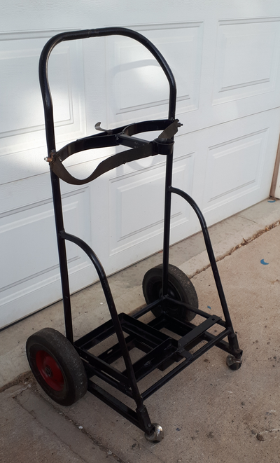 Wheeled cart for oxy acetylene tanks. About 42" tall. Will hold two tanks up to 8.5" in diameter. I...