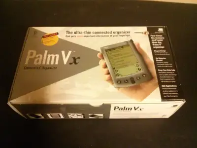 Full Palm Vx kit in original box, and Palm VIIx in leather portfolio. Accessories: - Travel kit incl...