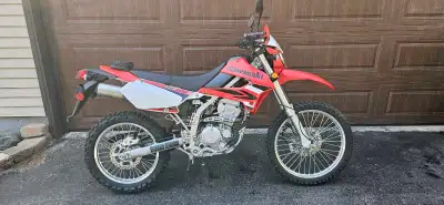 Selling my wife's 2009 Kawasaki KLX250S. It only has 2357km on it. The bike is mint. I put on some a...