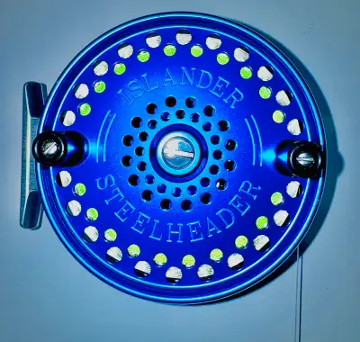 Islander Steelheader reel — blue, serial 11371, fully spool, View more