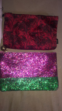 couple purses and makeup bags