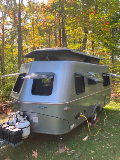Exterior Body Length 15’-5” Exterior Length Overall 18’-11” Interior Height with pop top roof 6’-5”...