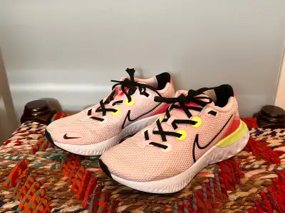 NIKE Renew runners size 8.5, View more