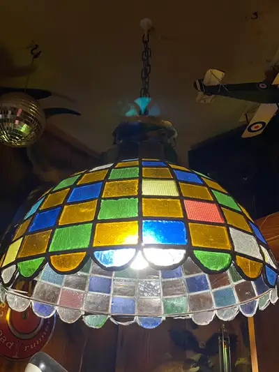 Old antique Tiffany hanging lamp, missing 2 stainless glass at the bottom other then that works perf...