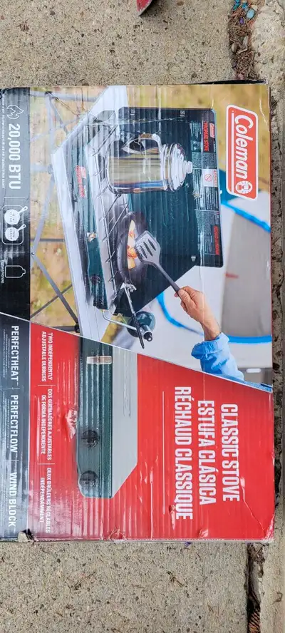 Coleman, portable 20000 BTU propane camp stove brand new in the box. Still in the package. Never use...