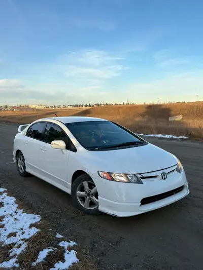For sale 2007 Honda Civic hybrid with 220k km on it Active clean title and Alberta registered -Featu...