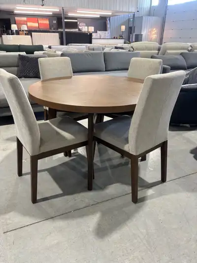 This 48 inch round dining table comes with four high back chairs . Our Price $750 Rubberwood solids...