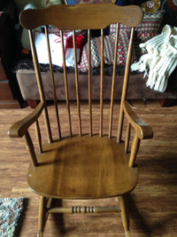 Wooden rocking chair.