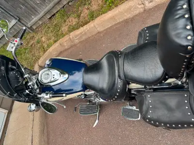 Lots of life left…2 helmets..2 jackets..gloves…sheep skin seat cover
