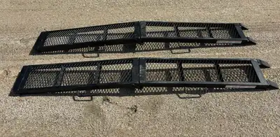 2 PowerFist 800lb. x 11" bi-fold loading ramps $135 . Steinbach area