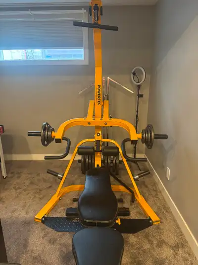 A Powertec levergym with 300 pounds of weight, View more
